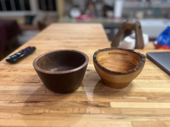 Hand-turned wooden bowls, including a natural-edge bowl